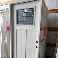 Exterior door with glass insert in stock
